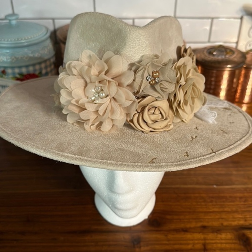 - Beautiful hand burned cowboy hat. Great fit. Medium Floral band